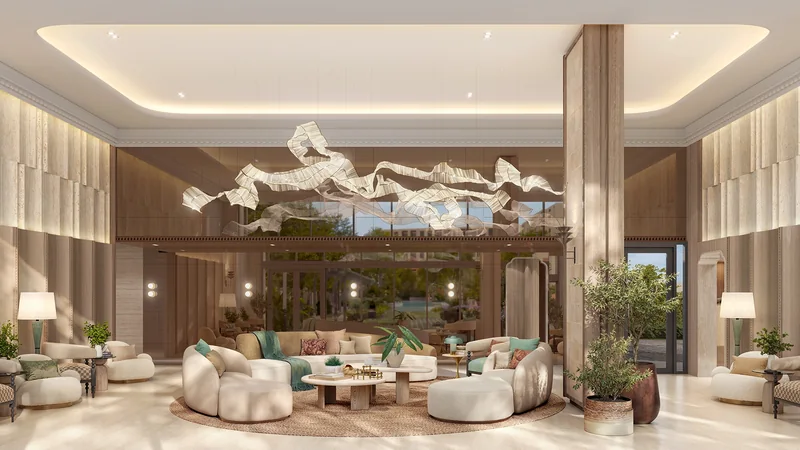 The Base Midtown Phuket lobby: double-height lounge with a light sculpture